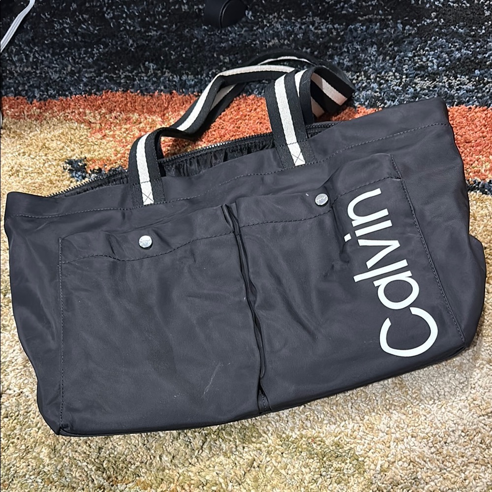 Calvin Klein Black Tote Bag with White Logo and Striped Handles